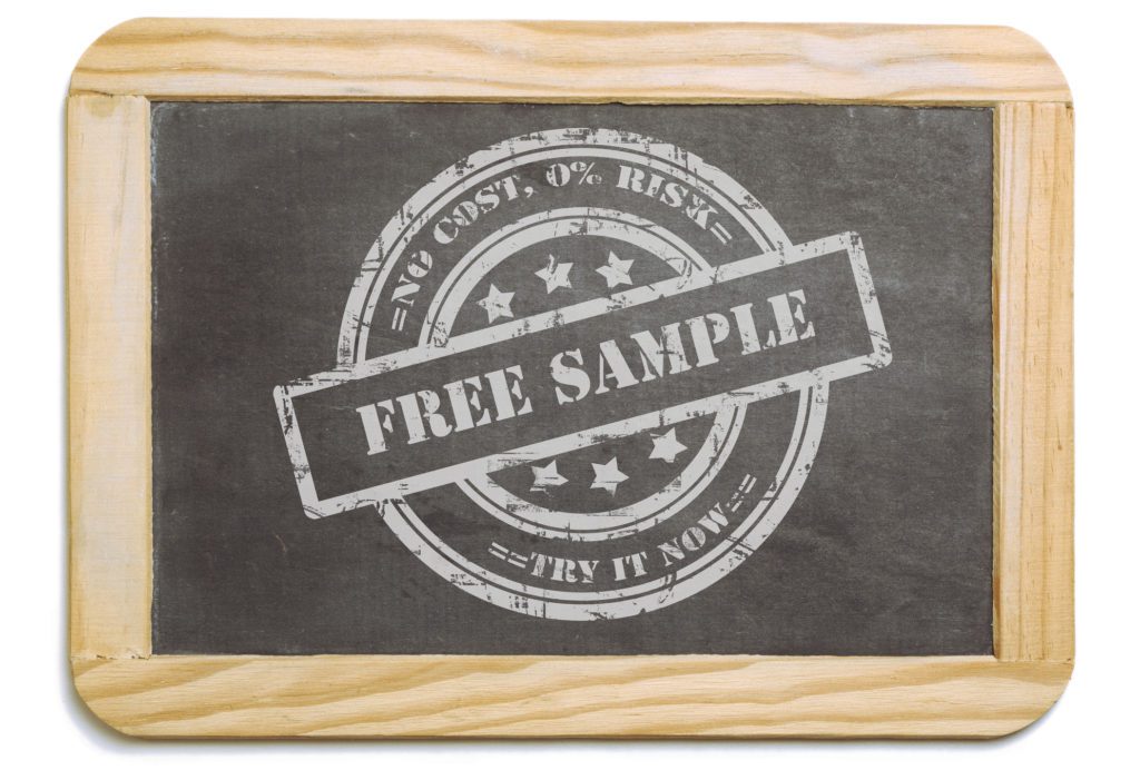 A chalkboard with a "free sample" graphic on it