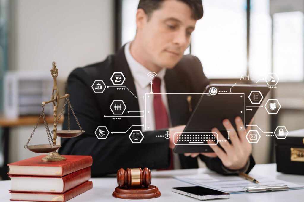 Attorney using digital content marketing for law firms with tablet device and scales of justice showing modern legal marketing strategy