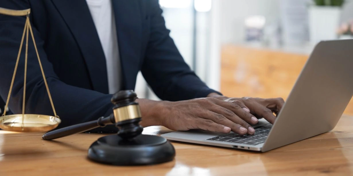 Attorney reviewing practice area pages for AI search optimization