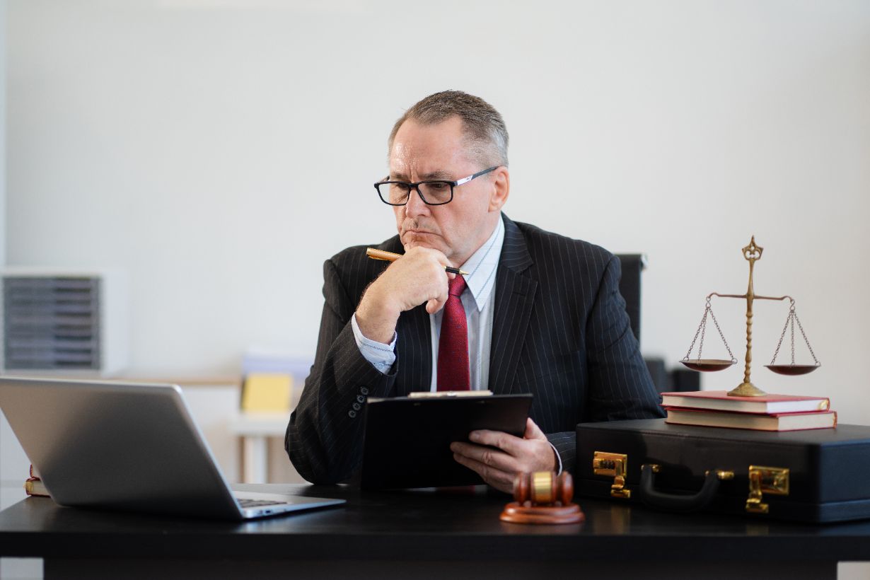 Attorney reviewing law firm SEO strategy on laptop